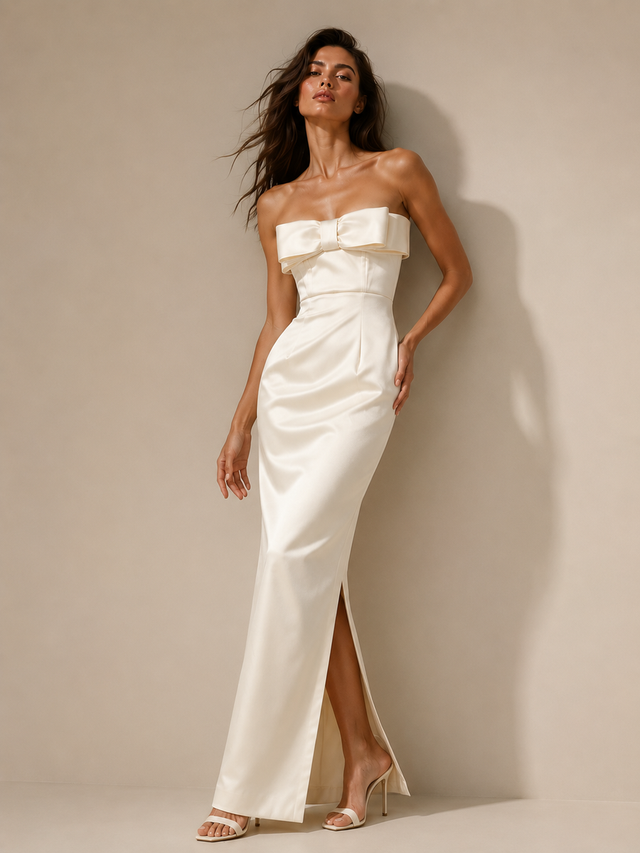 Ivory satin strapless evening gown with bow detail and minimalist column silhouette