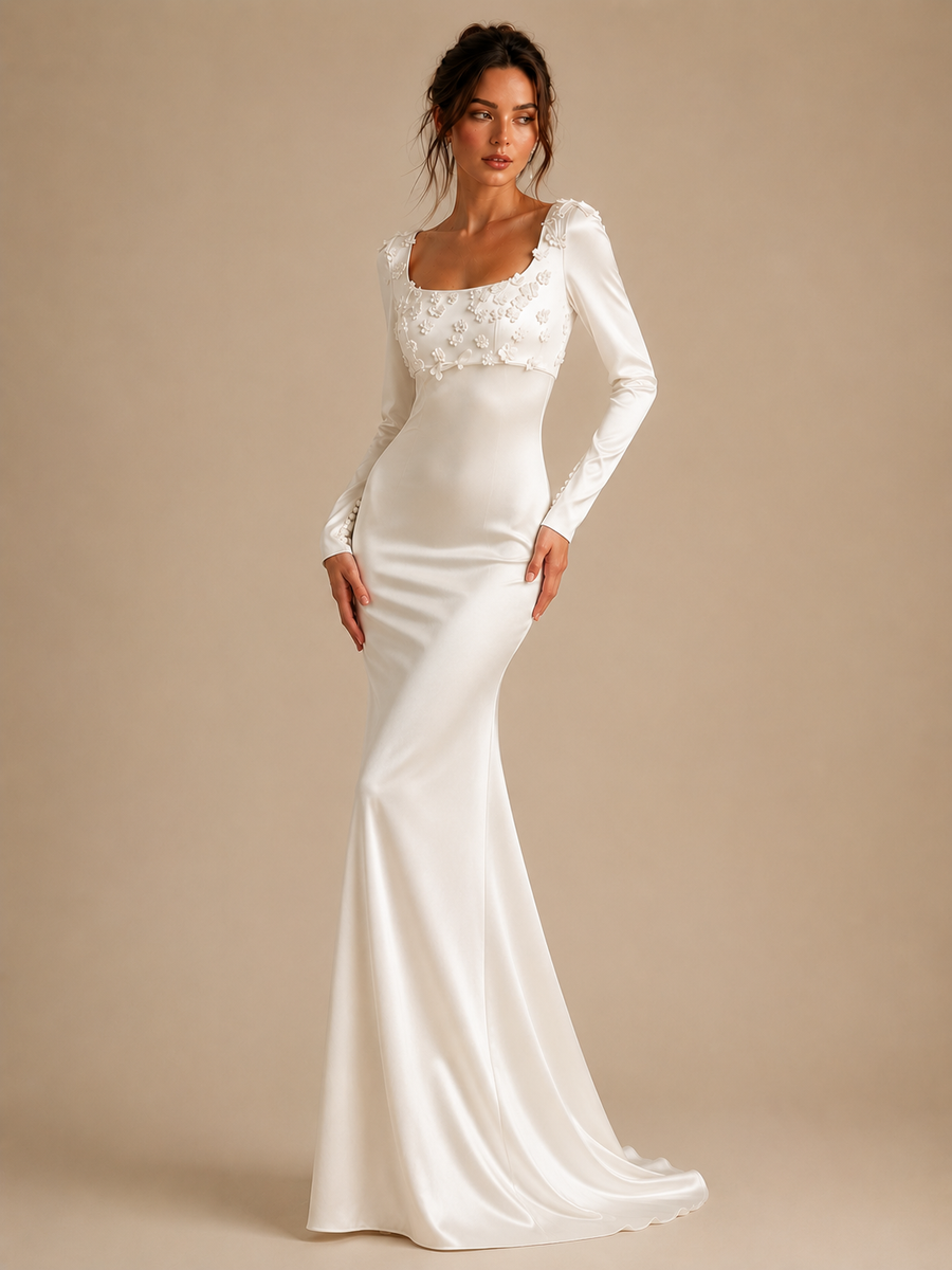 Ivory floral appliqué satin wedding guest dress with long sleeves and sculpted waist