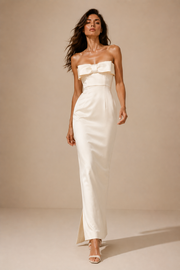 Ivory satin strapless column evening gown with elegant bow detail