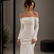 Ivory off-shoulder satin mermaid wedding guest dress with pearl draped neckline and long sleeves