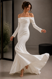 Ivory off-shoulder satin mermaid wedding guest dress with pearl draped neckline and long sleeves