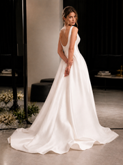 Elegant satin backless wedding dress with minimalist open back and flowing train