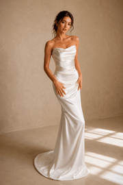 Ivory satin draped elegant wedding guest dress with minimalist bridal maxi gown silhouette.