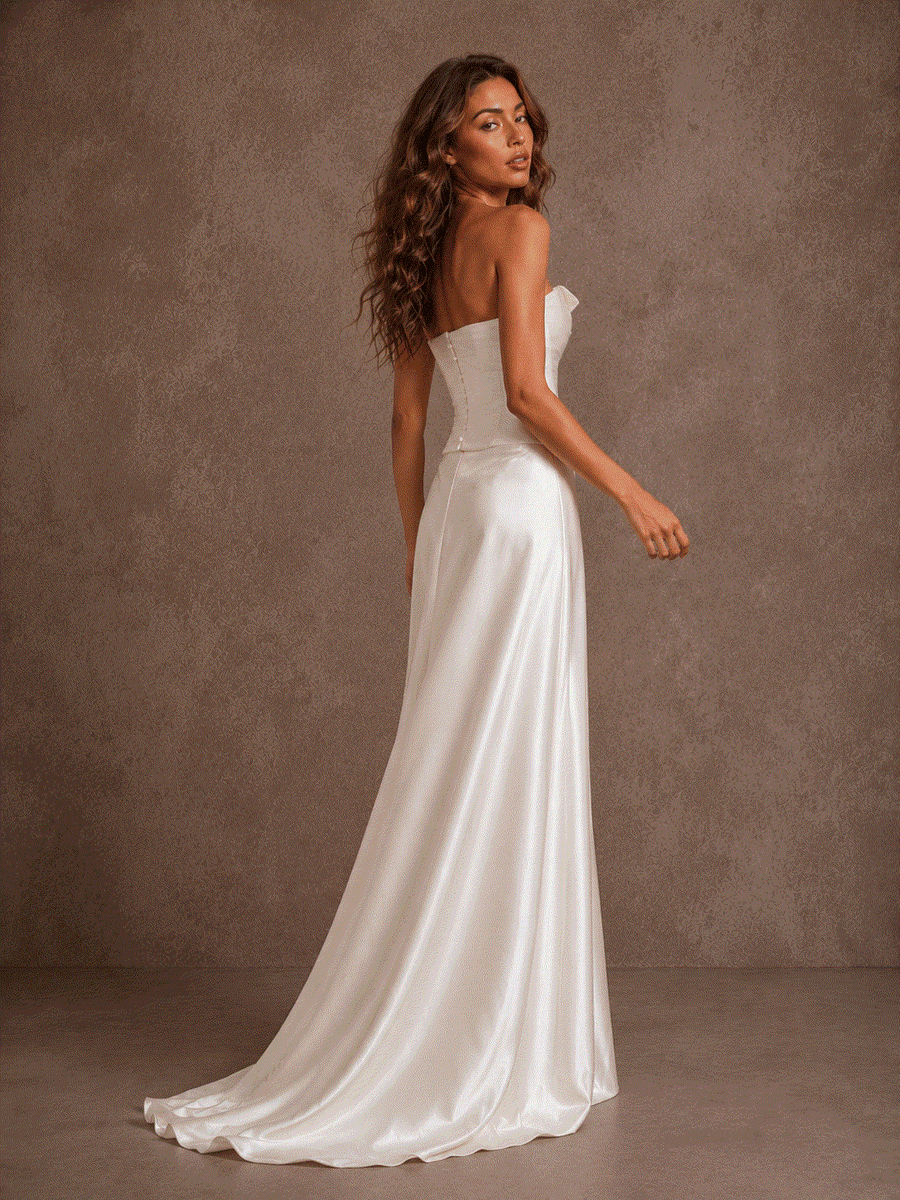 Elegant ivory satin corset wedding dress with ruched bodice and flowing train