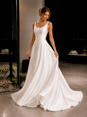 Elegant satin backless wedding dress with minimalist open back and flowing train