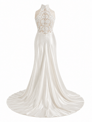 Ivory lace halter dress with sheer illusion bodice and draped train for elegant wedding guest look