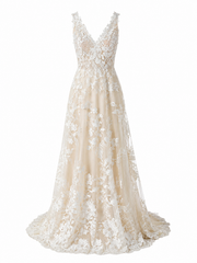 Ivory floral lace wedding dress with nude tulle and deep V neckline