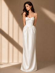 Elegant ivory satin corset strapless maxi evening gown with sculpted bodice and bow detail