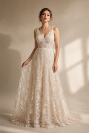 Ivory floral lace wedding dress with nude tulle and deep V neckline
