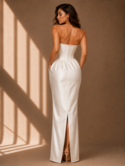 Ivory satin corset strapless evening dress with sculpted bow and floor-length hem