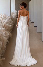 Elegant Celestial Drape Back wedding guest dress in minimalist flowing satin with strapless soft draped back design