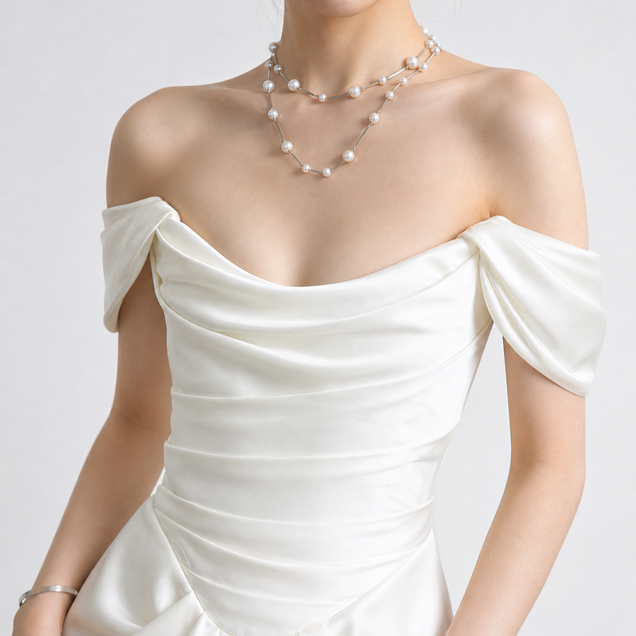Ivory Satin Off-Shoulder Wedding Gown - Draped Bodice & Extended Train Elegance