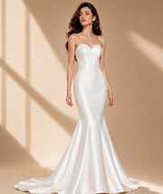Elegant sculpted satin mermaid dress with sweetheart neckline and contoured silhouette for formal wedding guests