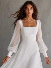 Celestia Whisper Bridal Gown - Minimalist Flowing Long Sleeve Wedding Dress