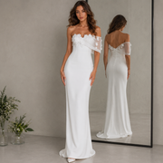 Ivory satin off shoulder wedding dress with 3D floral appliqués and minimalist sheath silhouette