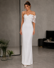 Ivory satin strapless off shoulder wedding dress with 3D floral appliqués and minimalist sheath silhouette