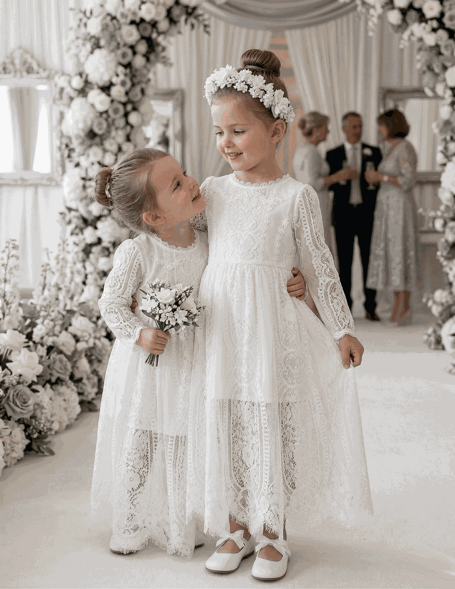 2-4 years girl wearing long white lace fairy dress with vintage flower girl design and puff sleeves