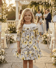 Girl wearing grey floral off-shoulder dress with subtle sheen and A-line silhouette for special occasions and everyday elegance