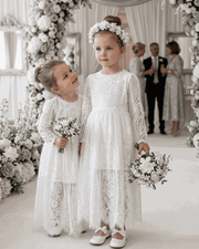 Girls Long White Lace Fairy Dress for 2-4 years, featuring delicate lace detailing and a flowing silhouette.