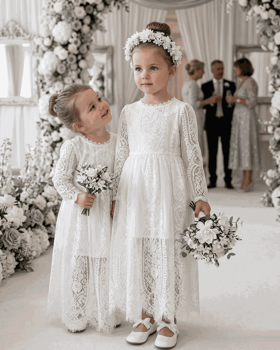 Girls Long White Lace Fairy Dress for 2-4 years, featuring delicate lace detailing and a flowing silhouette.