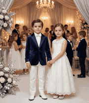 Boy aged 6-9 wearing a tailored navy velvet blazer with classic lapels for formal and everyday elegance
