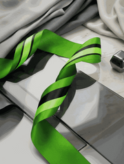 Emerald green satin ribbon set with three complementary textured ribbons for elegant styling and gift wrapping