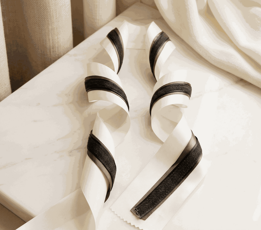 Ivory and charcoal satin ribbon set with layered widths for elegant weddings and gift styling