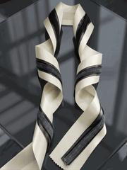Ivory and charcoal satin ribbons set with layered widths for elegant wedding and gift styling
