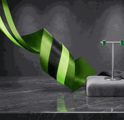 Set of three emerald green satin ribbons with varied textures and widths for elegant styling and gift wrapping