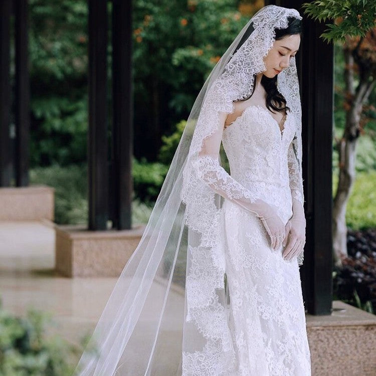 Black and white eyelash lace cathedral bridal veil with long wedding train made of soft chiffon tulle