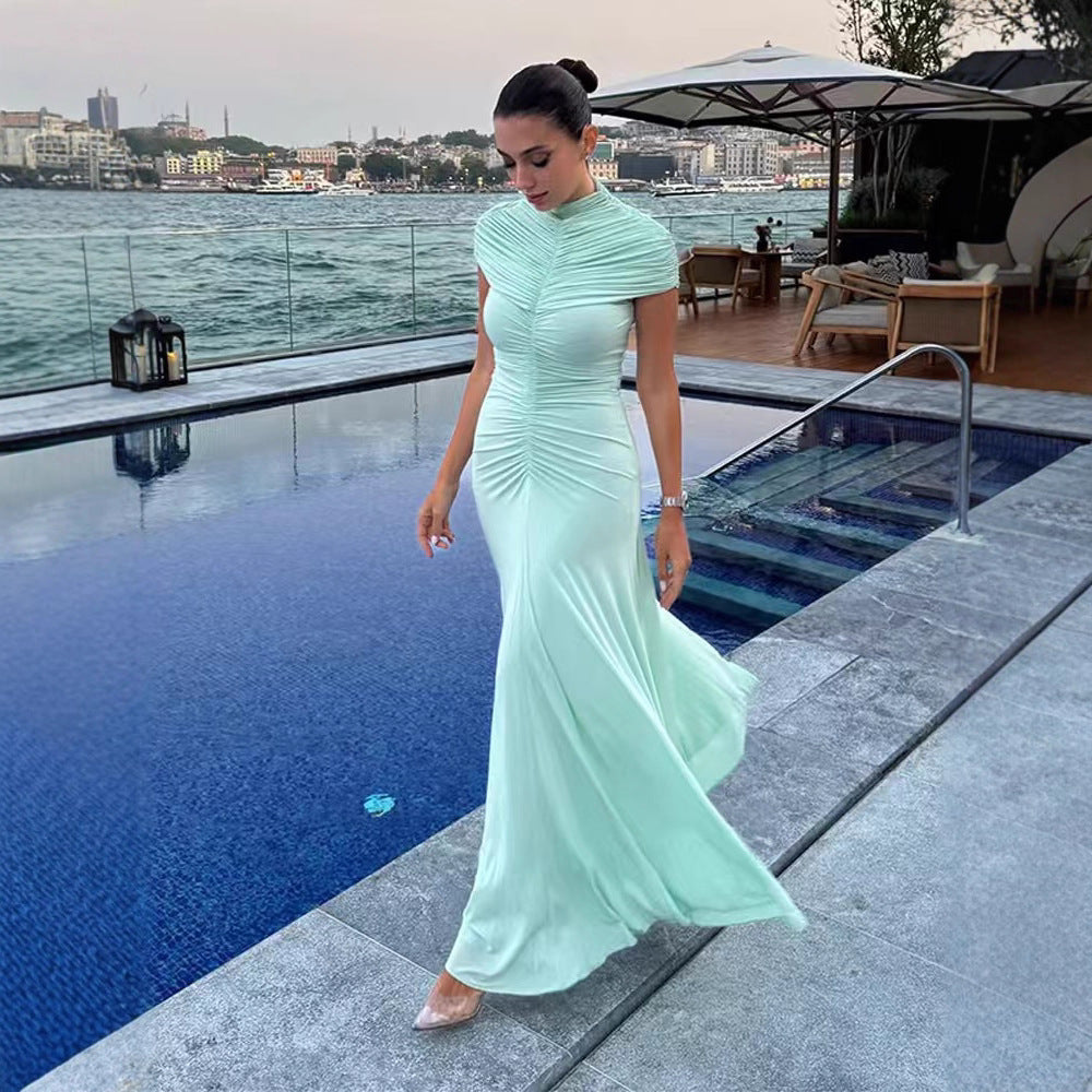 High-Neck Ruched Maxi Dress — A Draped Shoulder Overlay with a Flowing Skirt