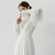 Vintage celestial lace formal wedding guest dress with high neck and chiffon bishop sleeves