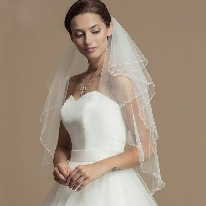Wrinkle-free soft tulle bridal veil with princess lace wedding headpiece on white background