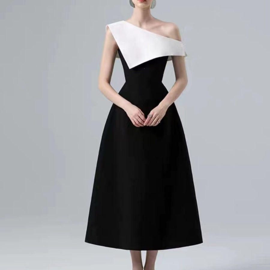 Black and White Midi Dress — A Sculptural Asymmetric Neckline with an A-Line Skirt