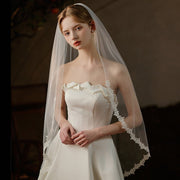 Sheer lace waist-length bridal veil made of soft chiffon tulle, single-layer and lightweight wedding headpiece