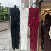 High-Neck Draped Maxi Dress — A Subtle Cut-Out with Sculptural Hip Folds