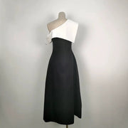 Black and White Midi Dress — A Sculptural Asymmetric Neckline with an A-Line Skirt