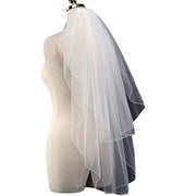 Wrinkle-free soft tulle bridal veil with princess lace wedding headpiece on a white background