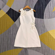 Floral Appliqué Mini Dress — Sculptural Blooms with a Cut-Out Back