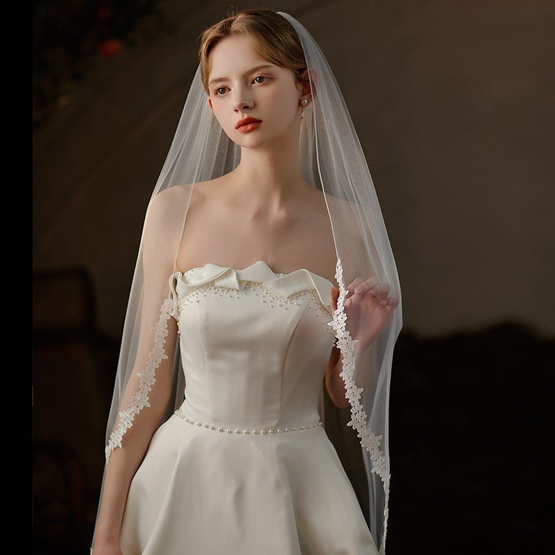 Sheer lace waist-length bridal veil made of soft chiffon tulle, single-layer and lightweight wedding headpiece