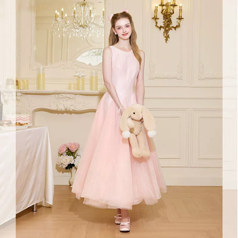 Elegant pink evening gown with clean lines and fluid silhouette for special occasions