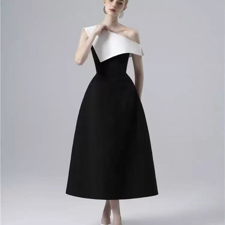 Black and White Midi Dress — A Sculptural Asymmetric Neckline with an A-Line Skirt