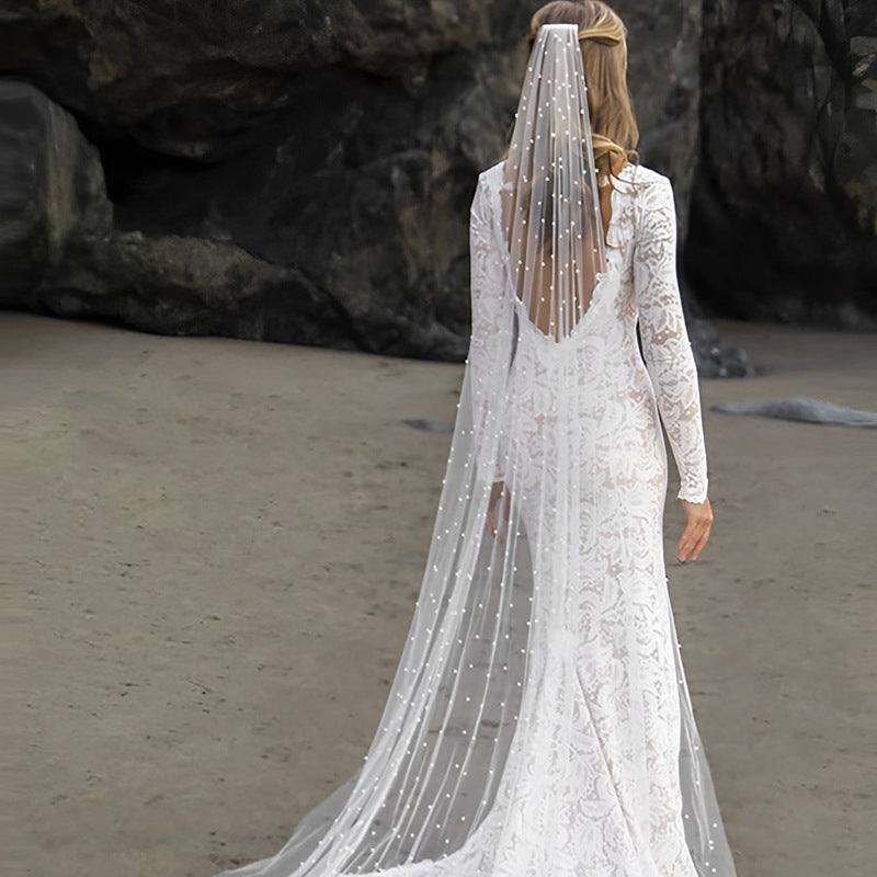 Beaded mid-length bridal veil made of soft lace tulle, lightweight and elegant for weddings and ceremonies