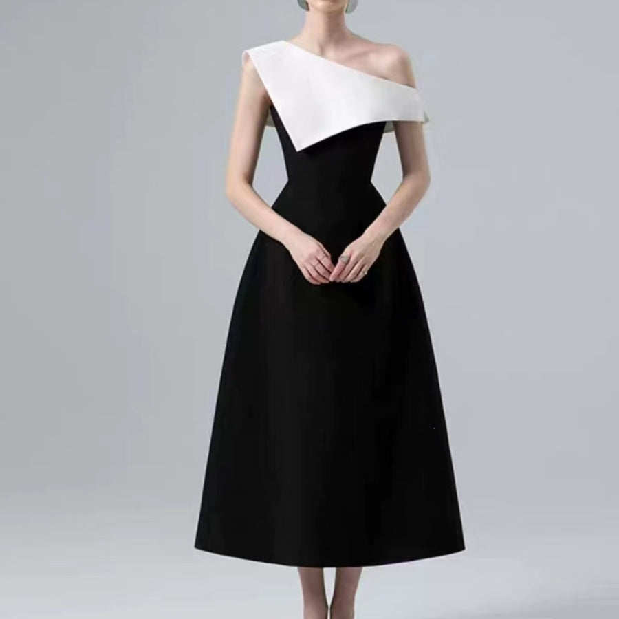 Black and White Midi Dress — A Sculptural Asymmetric Neckline with an A-Line Skirt