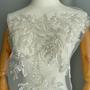 Zh488 new floral embroidery design with beaded appliqué, heavy beading, and silver floral sequins on lace fabric
