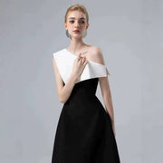 Black and White Midi Dress — A Sculptural Asymmetric Neckline with an A-Line Skirt
