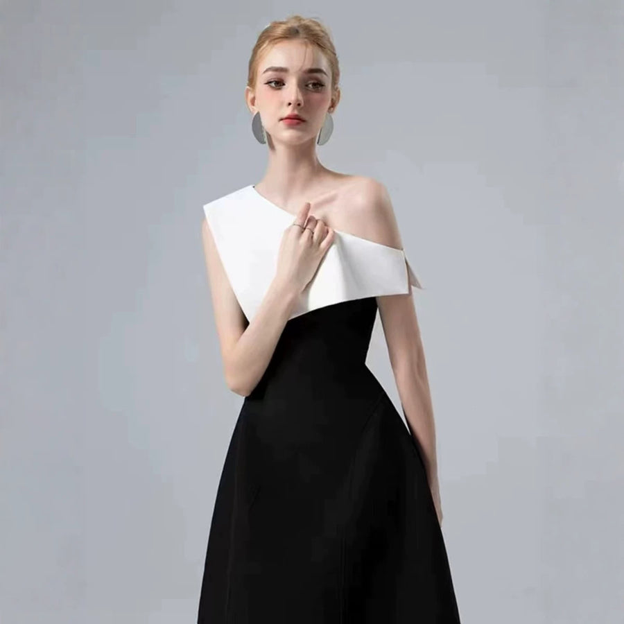 Black and White Midi Dress — A Sculptural Asymmetric Neckline with an A-Line Skirt