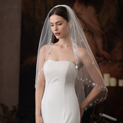 Heart flower hair comb on sheer single-layer bridal veil with lace detailing