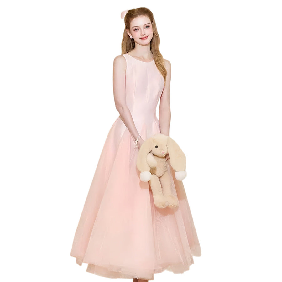 Elegant pink evening gown with clean lines and fluid movement for formal celebrations