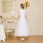 Elegant pink evening gown with fluid silhouette for formal events and celebrations